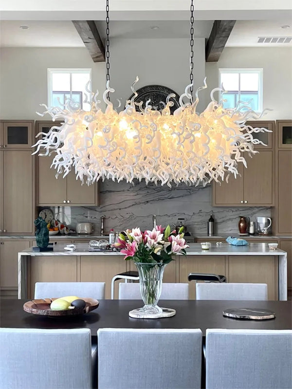 white glass chandelier in dining room